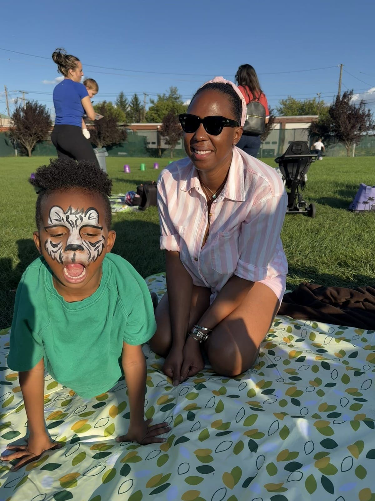 A young attendee shows off face paint during Union’s movie-night gathering.
